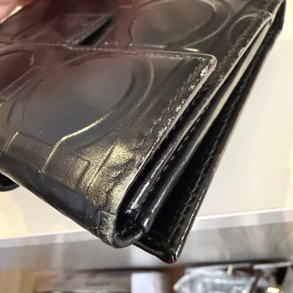Salvatore Ferragamo Gancini Black Embossed Bifold Leather Wallet